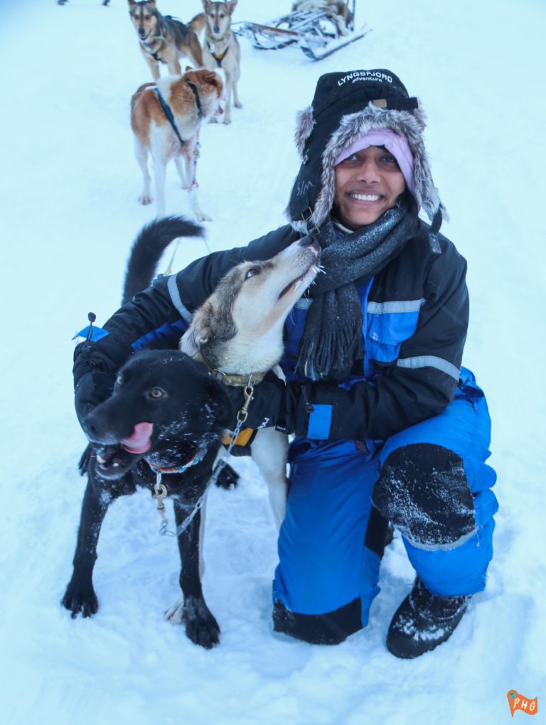 Dog Sledding in Tromso Norway: Adventure Guide and Review 15 First time hugging a dog, Tromso, Norway